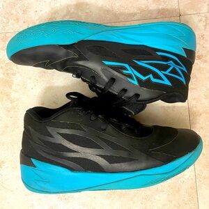 Puma Melo 1 black and blue size 2.5C in good condition